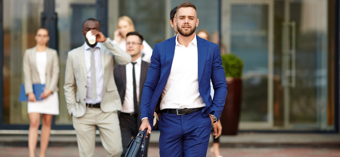 Employer Brand Blog Graphic that showcases a group of people in professional clothing walking outside.